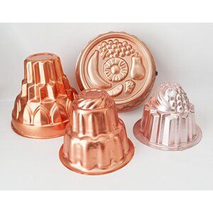 Set Of 4 Vintage Copper-Tone Jelly Molds With Fruit & Geometric Designs Assorted